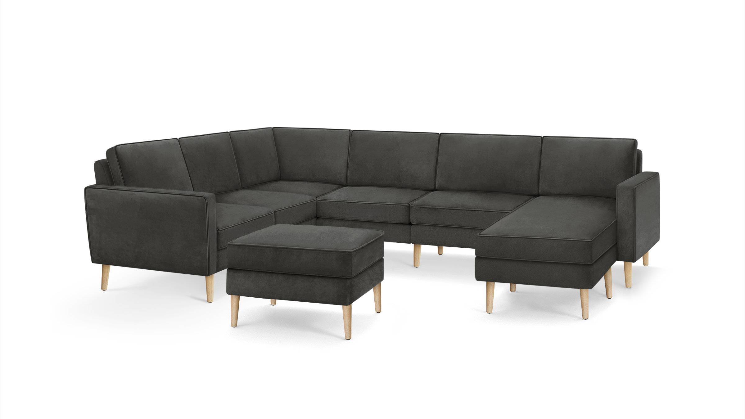 modern dark gray sectional sofa with wooden legs and matching ottoman, featuring a clean, minimalist design