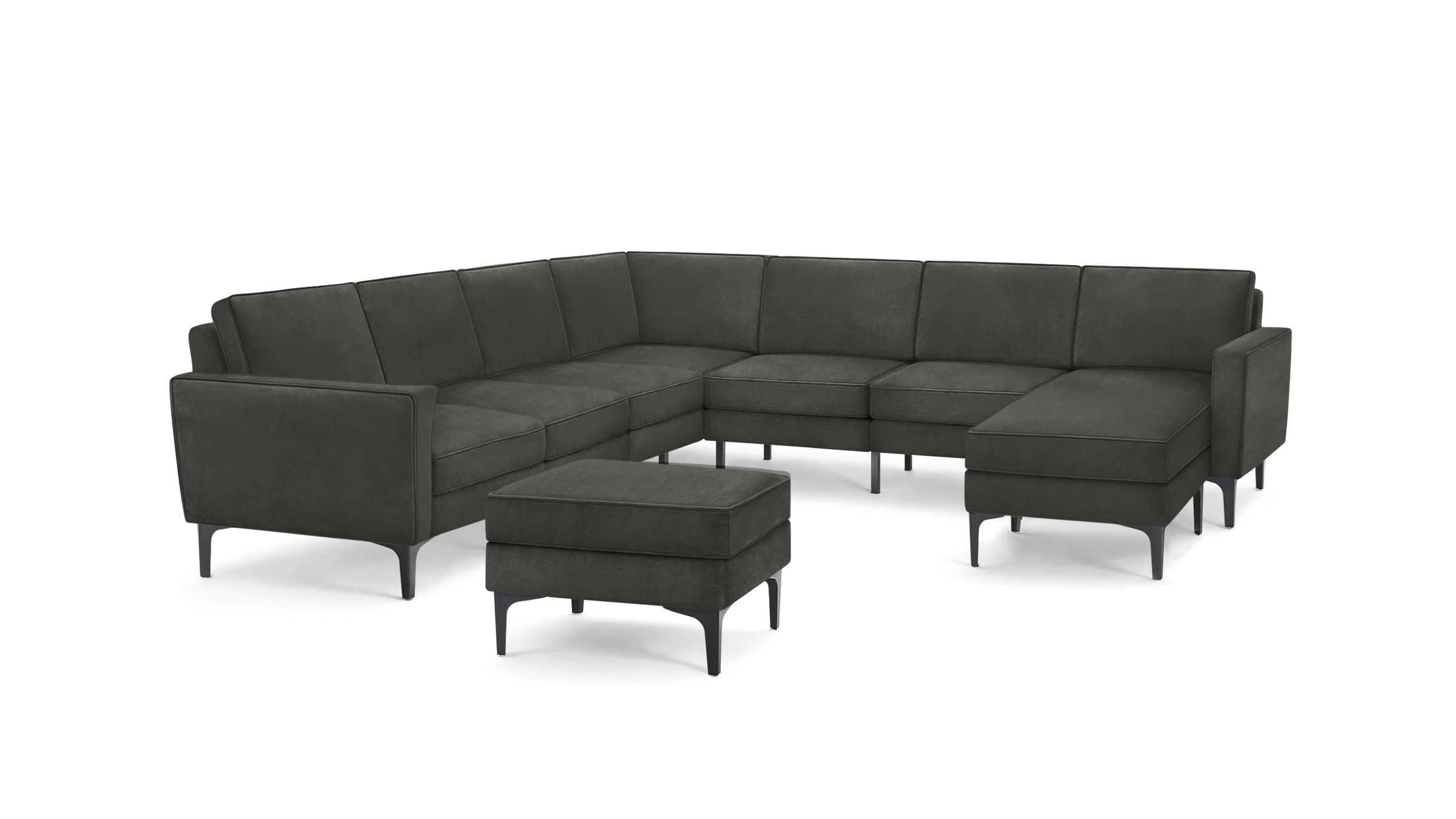 modern dark gray sectional sofa with tufted back cushions and matching ottoman, featuring a matching ottoman, and matching ottoman