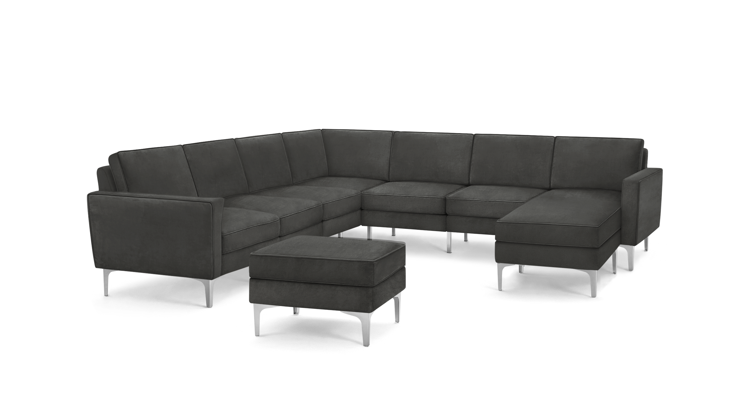 modern dark gray sectional sofa with tufted back cushions and matching ottoman, featuring a sleek metal frame and sleek lines