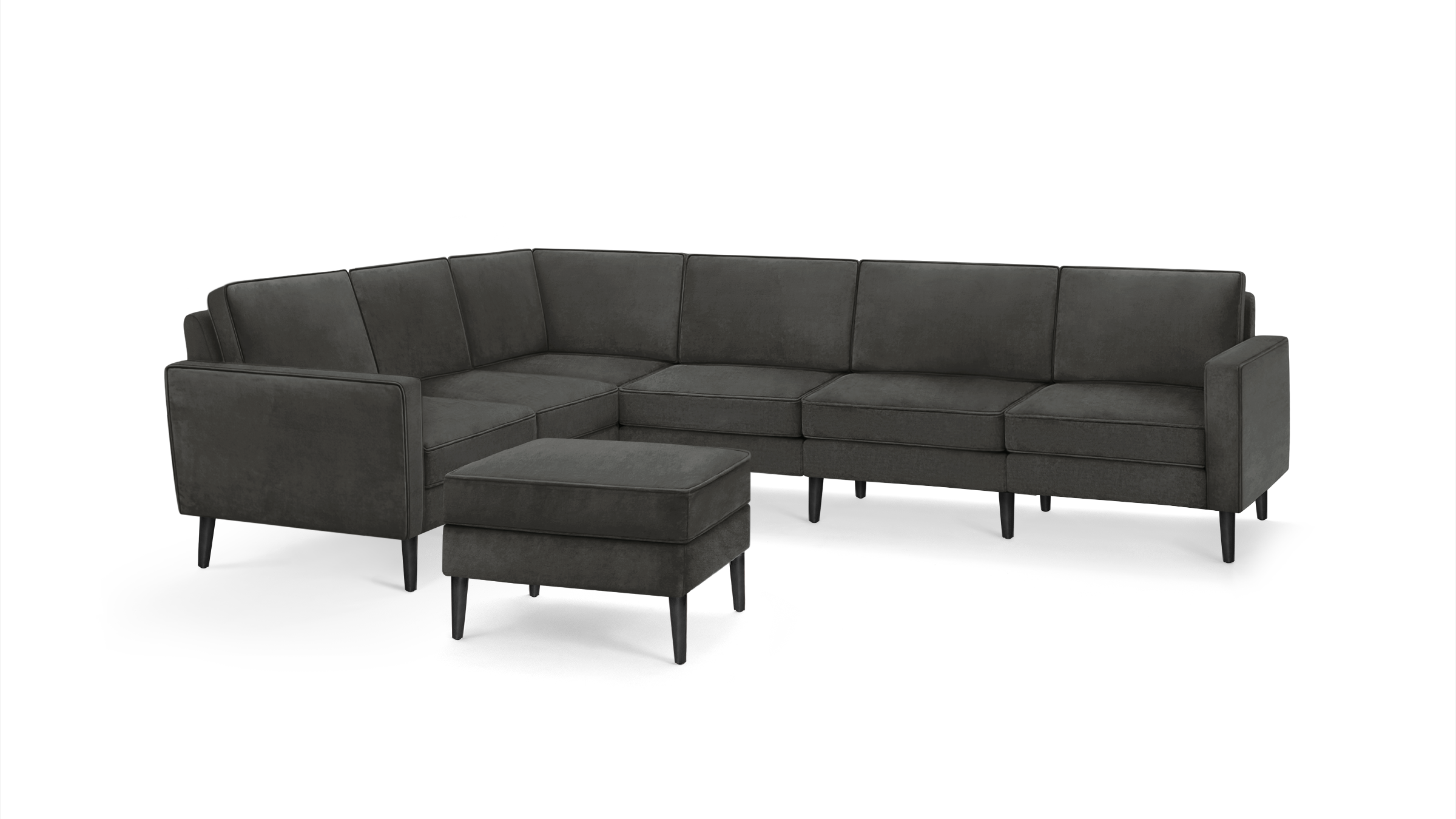 modern dark gray sectional sofa with matching ottoman, featuring tapered, tapered legs, and a matching ottoman on the right side