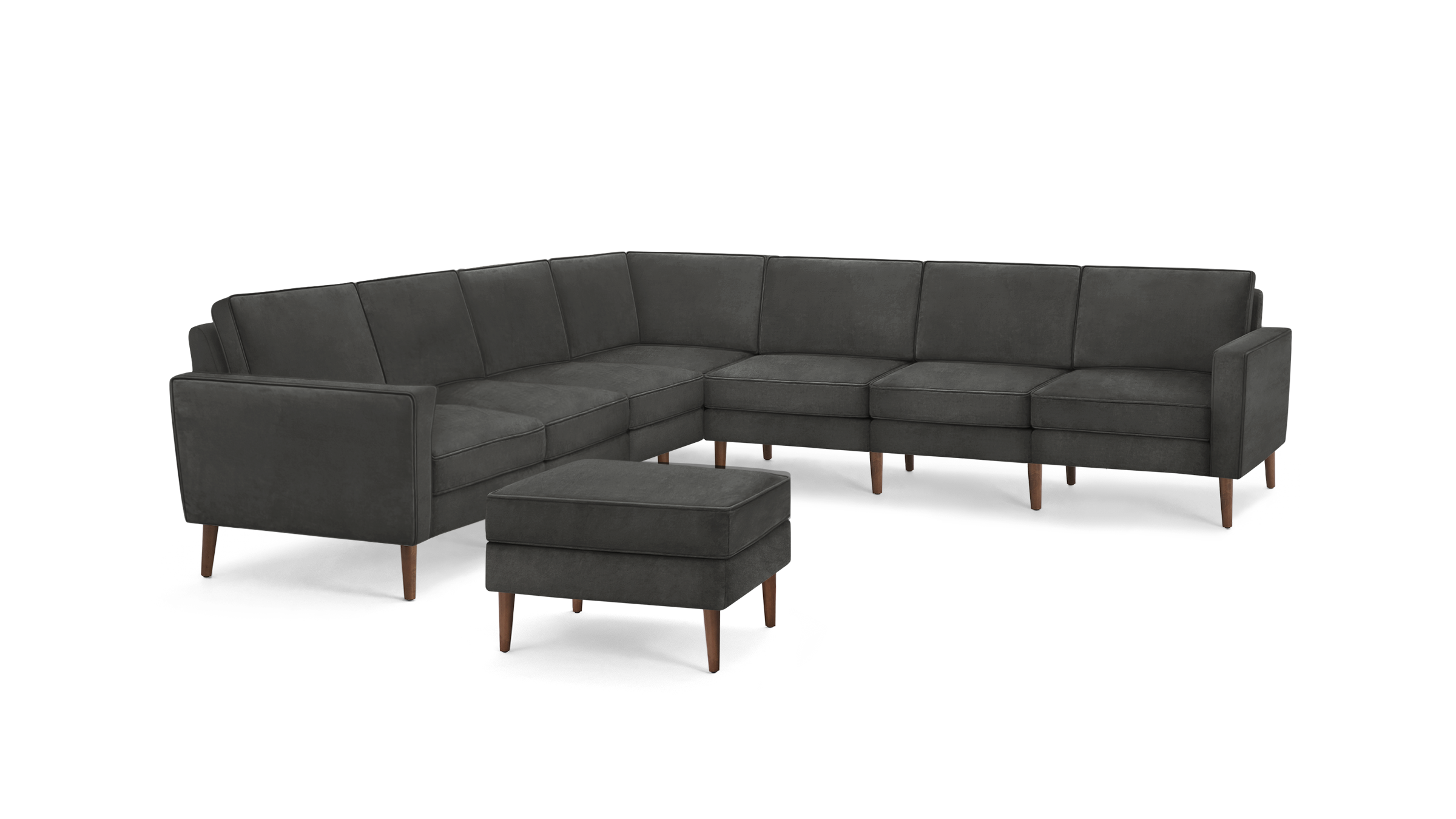 dark gray sectional sofa with wooden legs and matching ottoman