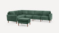 Green velvet L-shaped sectional sofa with wooden legs and matching ottoman, designed for modern living rooms.