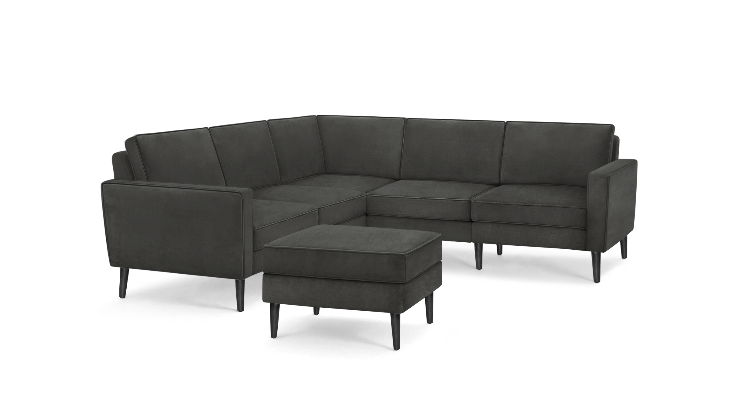 modern dark gray sectional sofa with matching ottoman, featuring sleek lines and sleek lines, featuring a sleek design and sleek lines