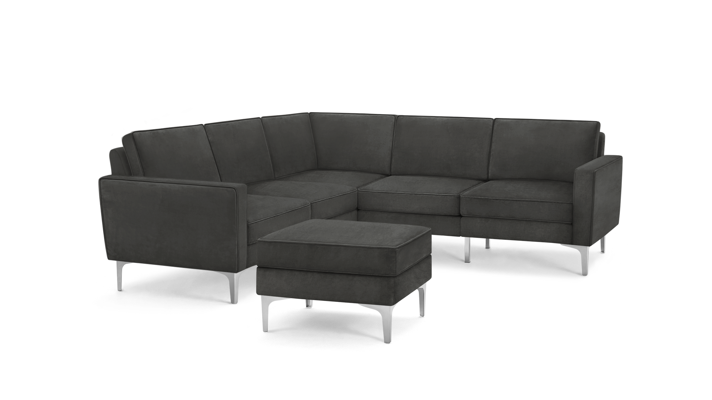 modern dark gray sectional sofa with matching ottoman, featuring sleek metal legs and sleek design on the right side