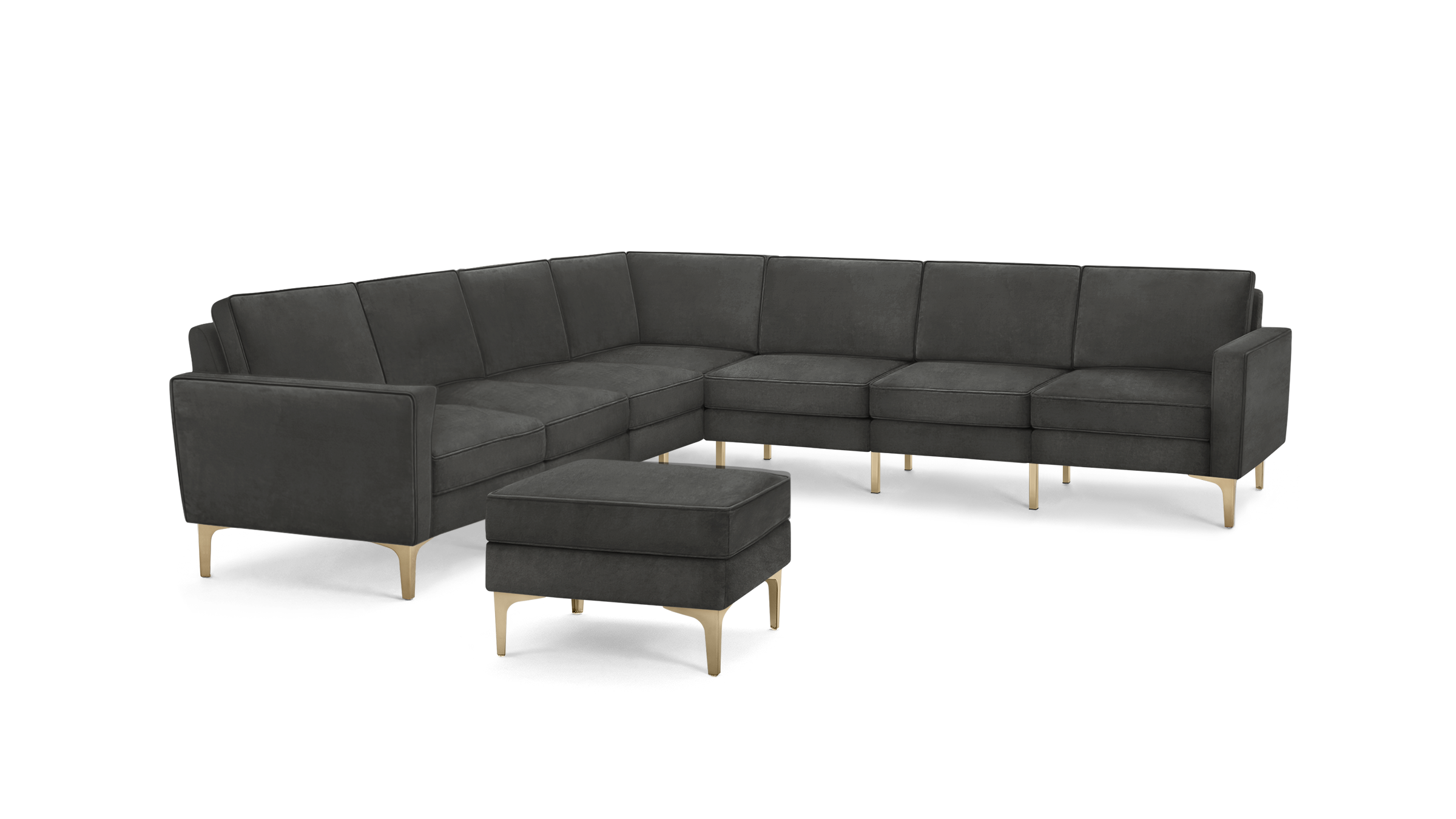 modern dark gray sectional sofa with gold legs and matching ottoman, featuring a clean, minimal design