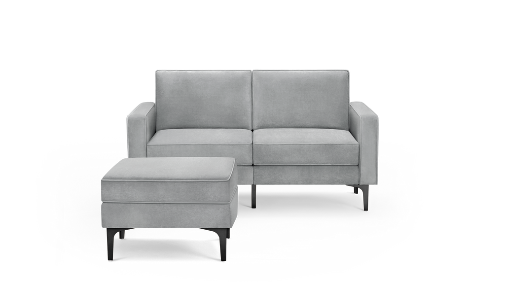 modern gray velvet sofa with matching ottoman and matching ottoman, featuring a sleek, modern design