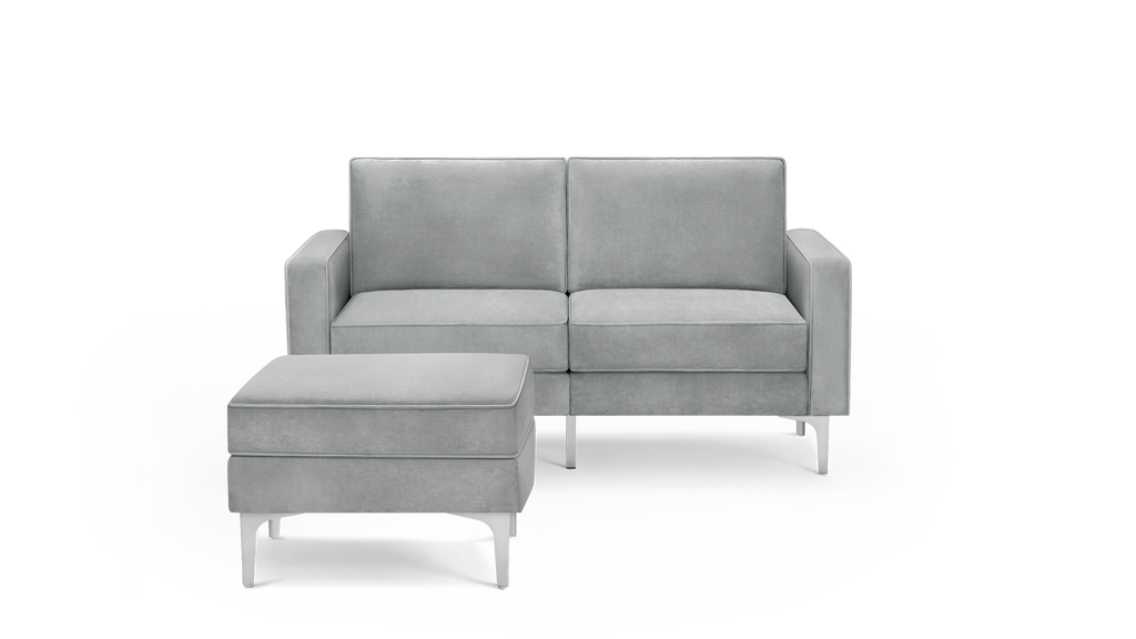 modern gray velvet sofa with matching ottoman and matching ottoman, featuring a sleek design and sleek lines
