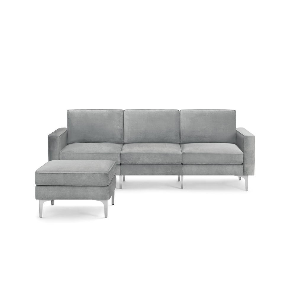 modern gray sectional sofa with metal legs and a chaise lounge on the right side