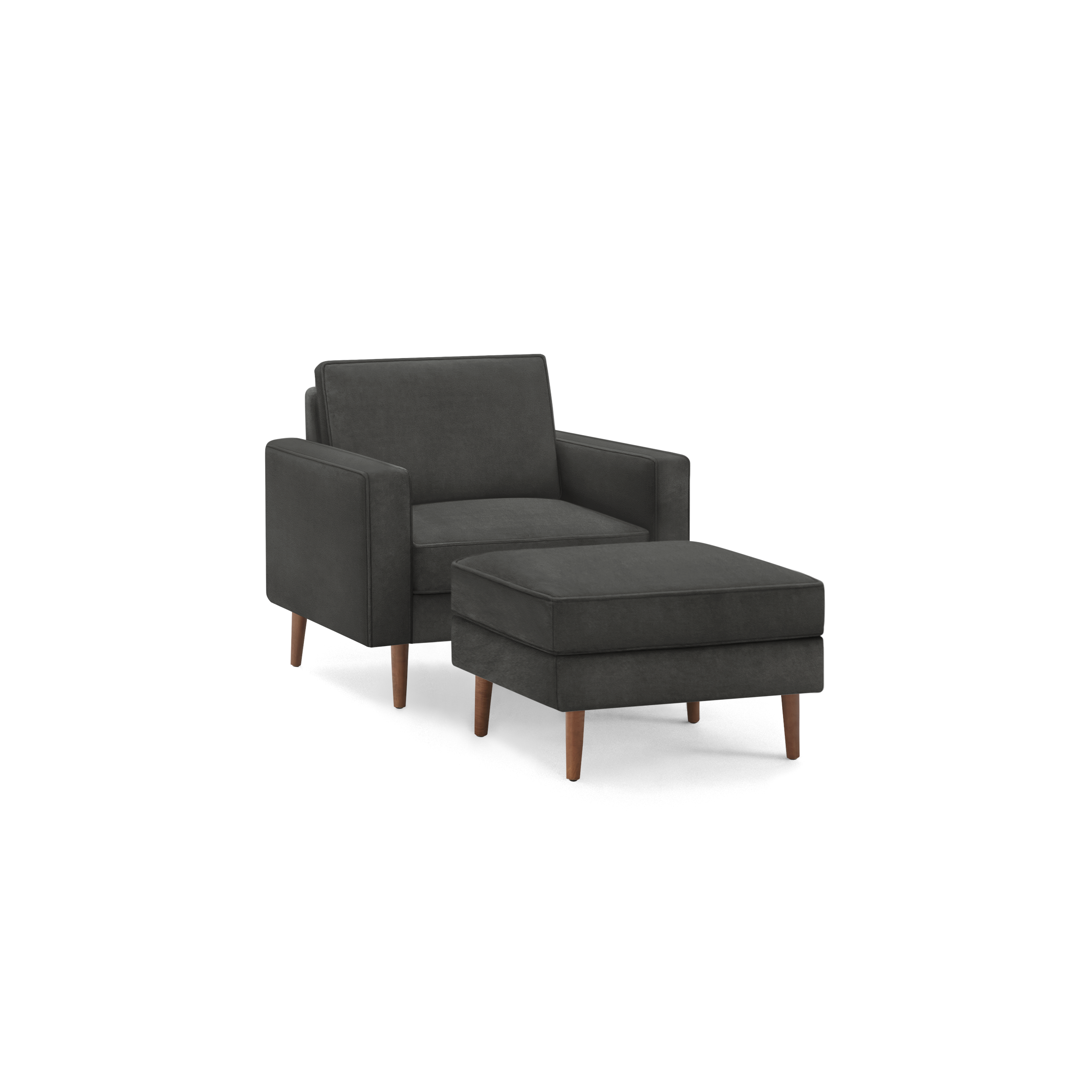 modern dark gray upholstered armchair with wooden legs and a matching ottoman on a black background