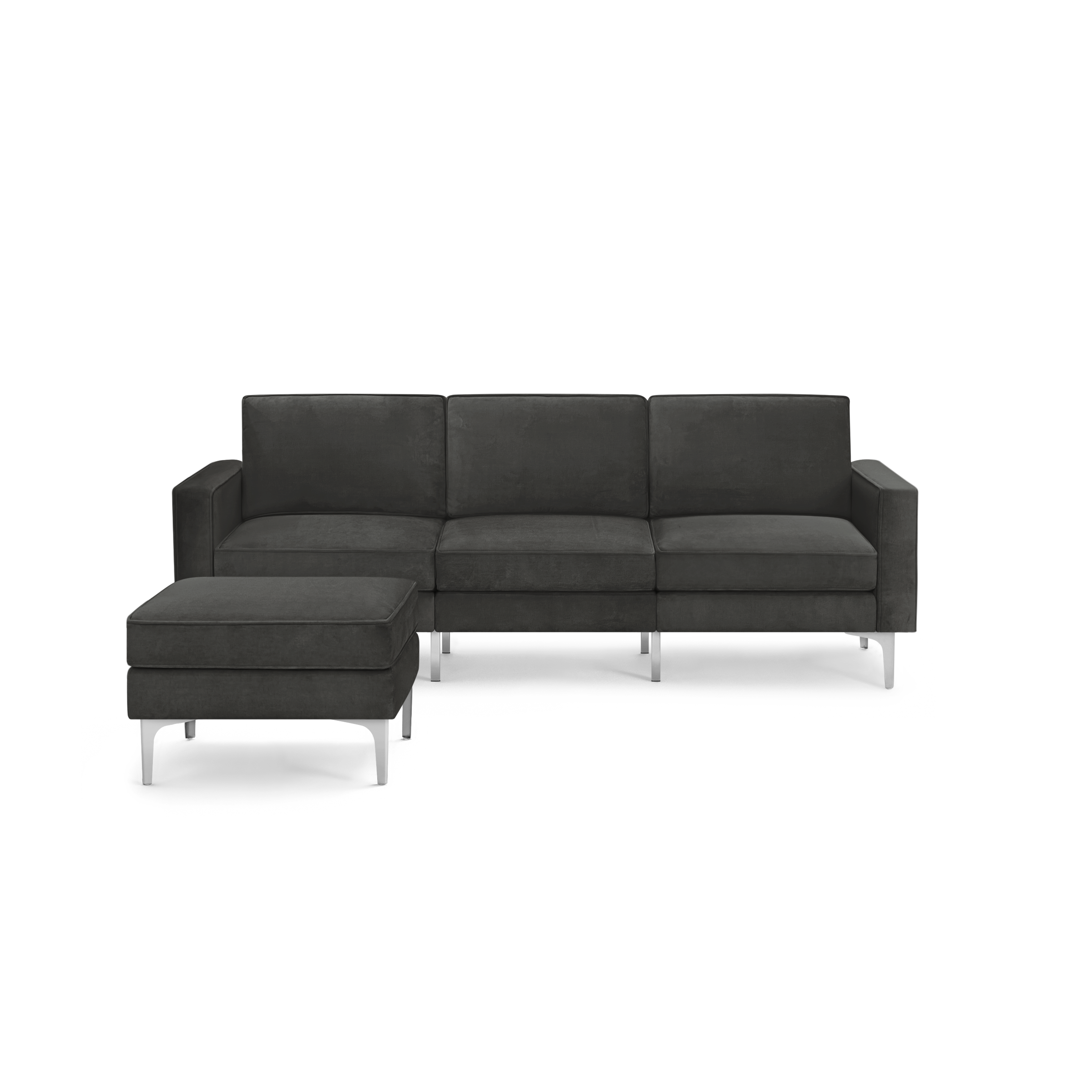 modern dark gray sectional sofa with chaise lounge and matching ottoman, featuring sleek metal legs and sleek backrests