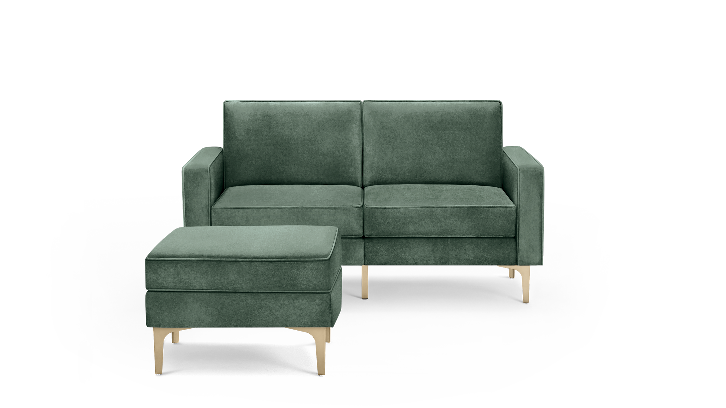 modern green velvet sofa with matching ottoman and wooden legs, featuring a sleek design and clean lines