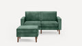 Green velvet two-seater sofa with matching ottoman, featuring clean lines and wooden tapered legs, set against a white background.