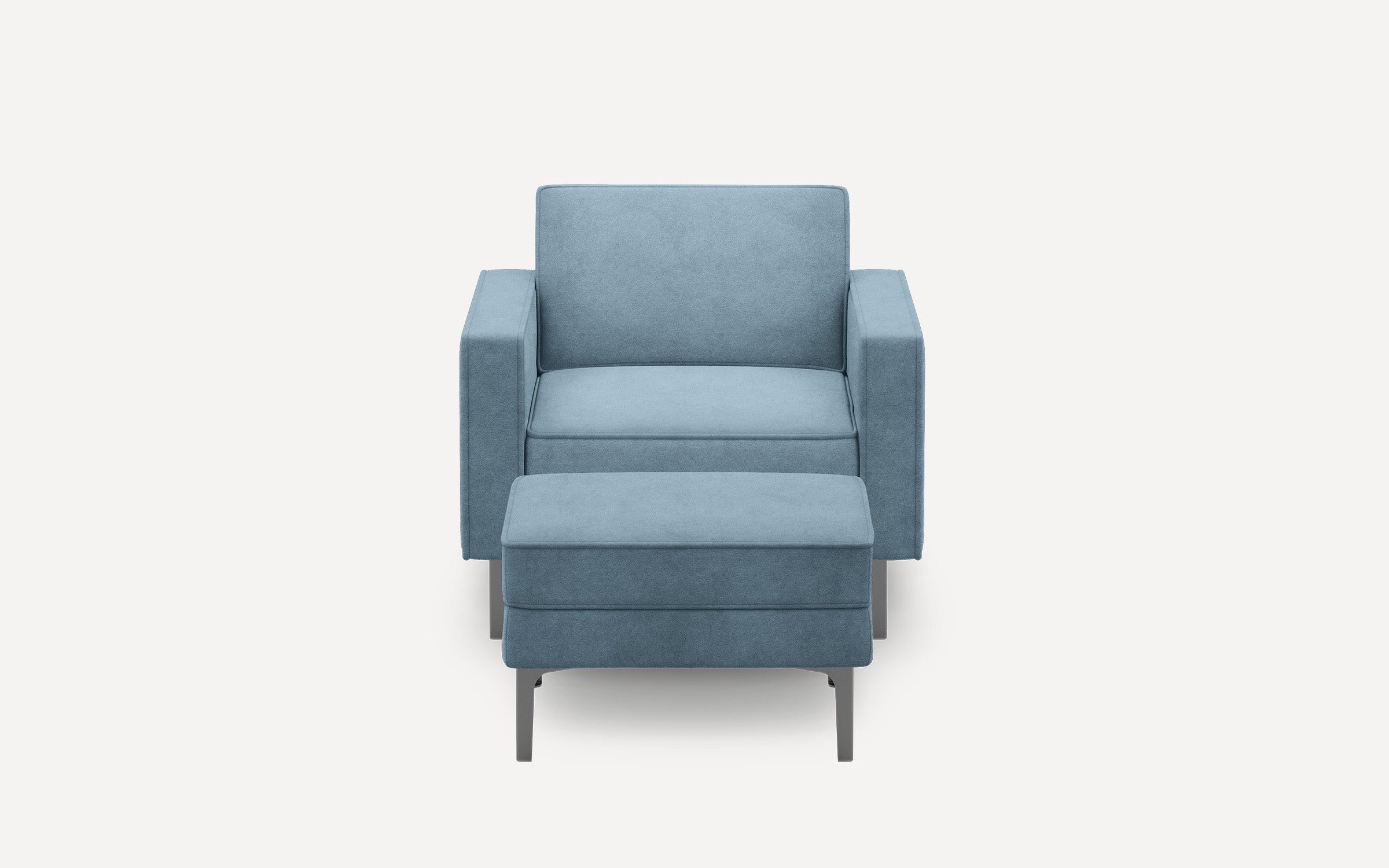 Modern light blue upholstered armchair with matching ottoman on metal legs, shown from the front on a plain white background.