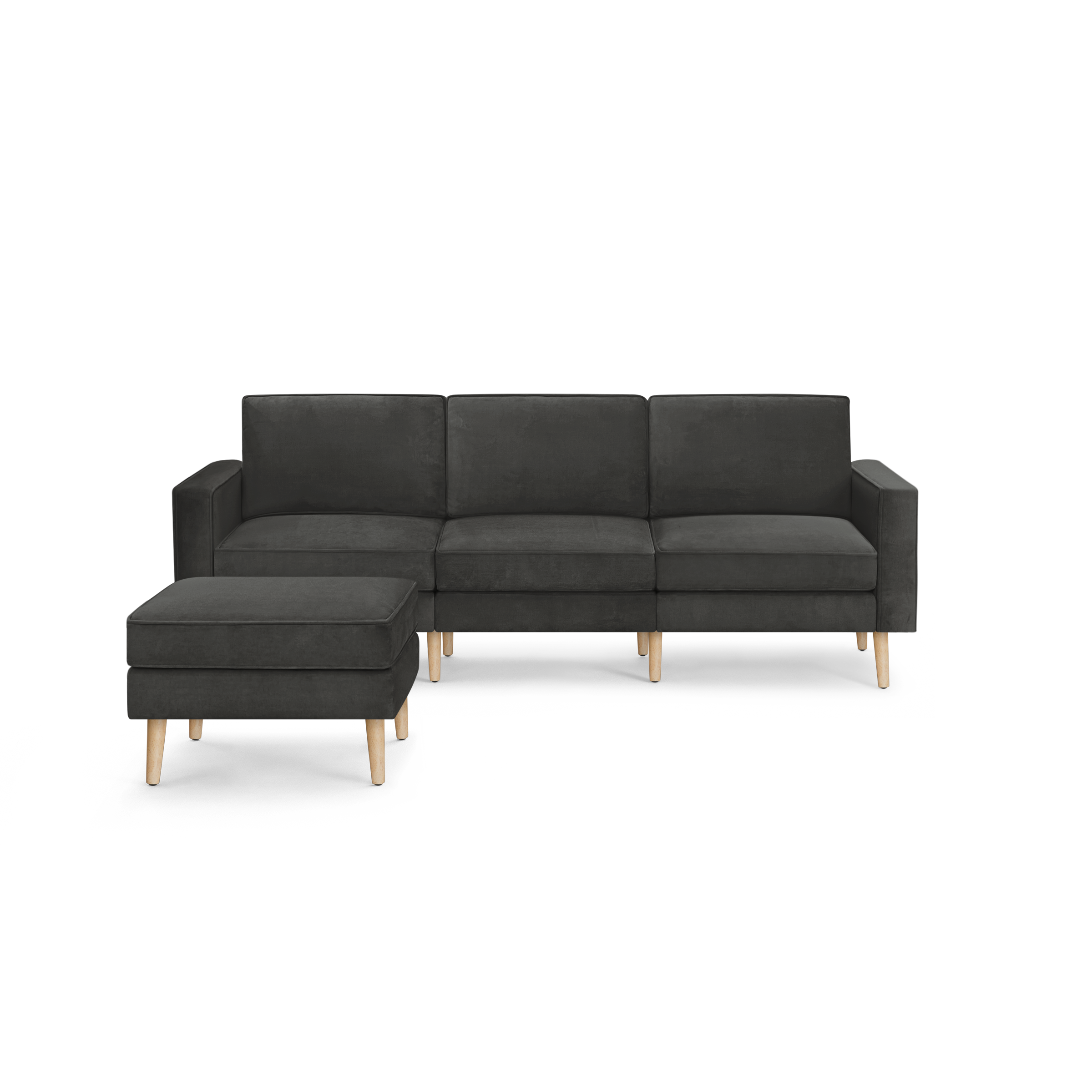 modern dark gray fabric sectional sofa with wooden legs and clean lines on the back, featuring a chaise lounge and matching ottoman