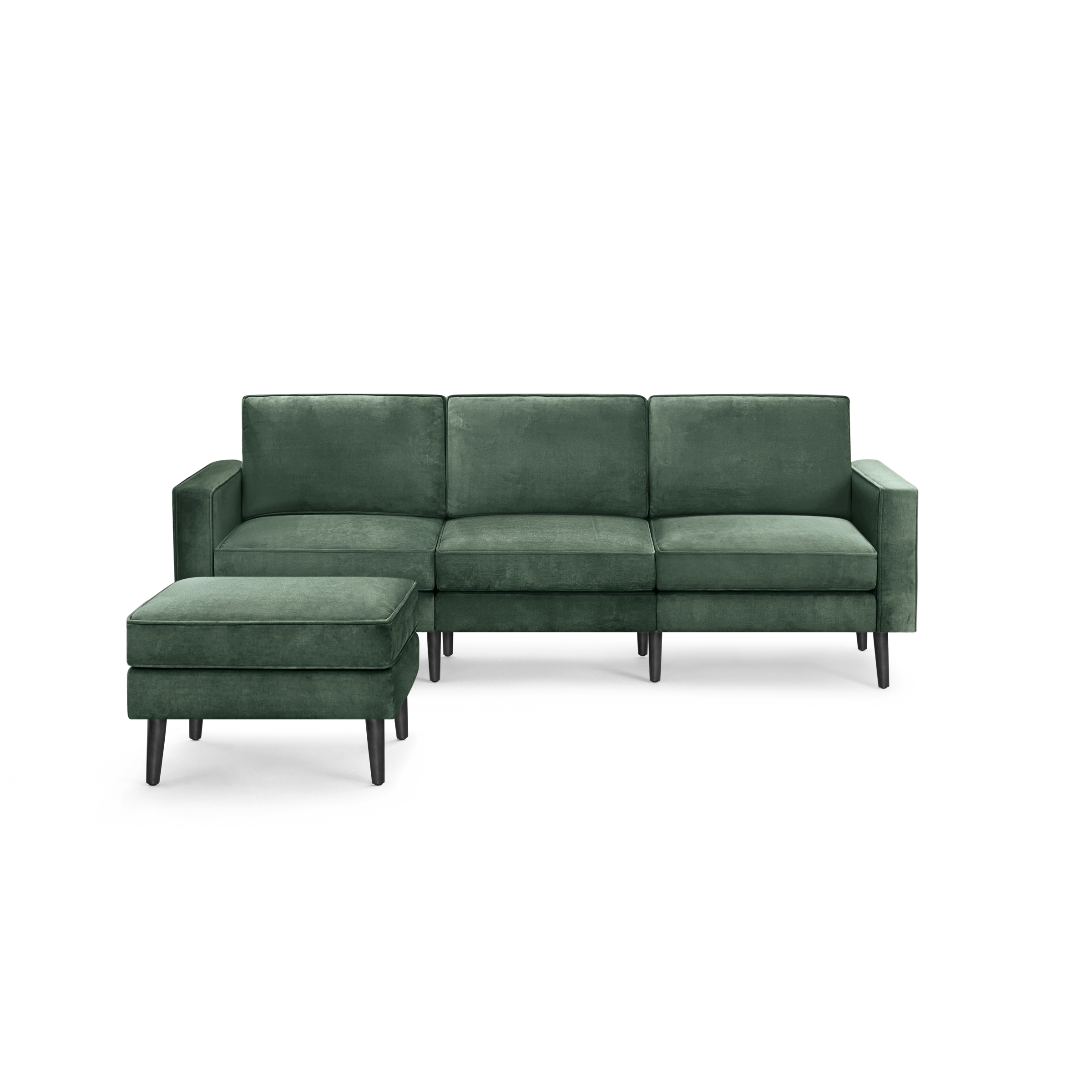 modern green velvet sectional sofa with black metal legs and clean lines on the back, featuring a deep green velvet upholstery