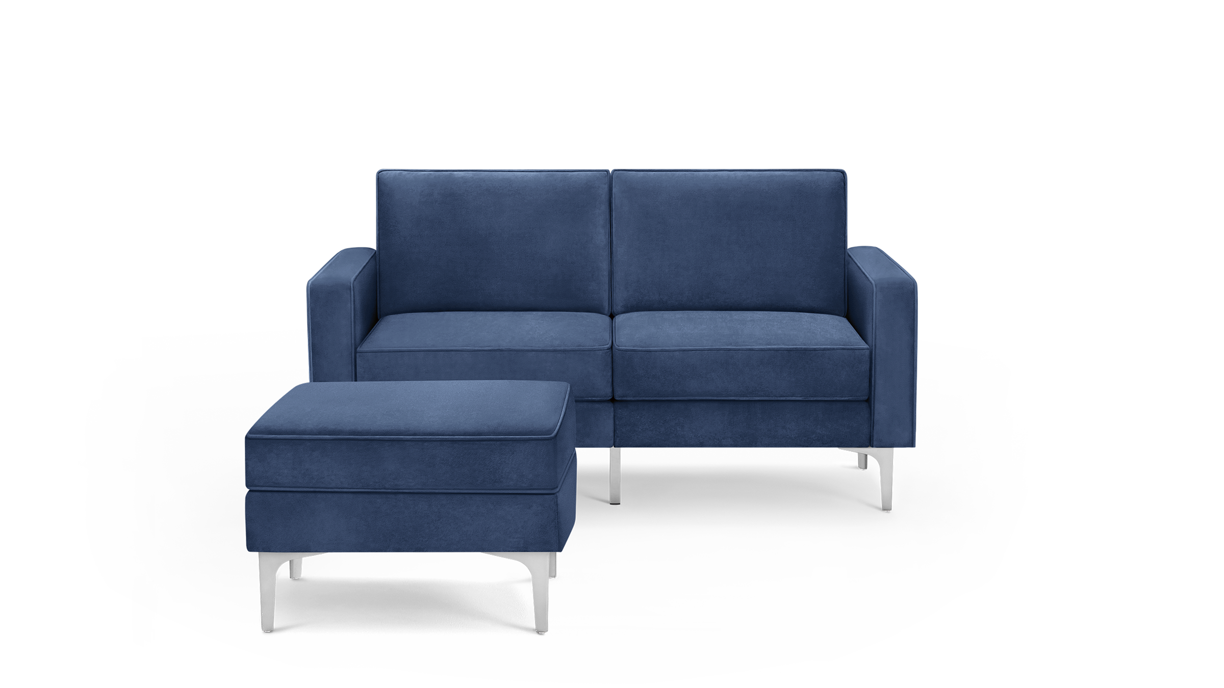 modern blue velvet sofa with matching ottoman and matching ottoman, featuring a sleek metal frame, and sleek lines