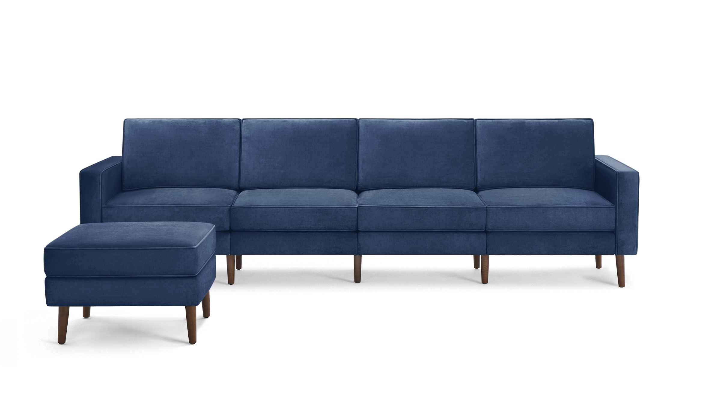 modern blue velvet sofa with wooden legs and matching ottoman, featuring a clean, modern design