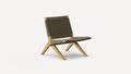 Modern lounge chair with angled light wood frame and woven dark gray fabric seat and backrest on plain white background.