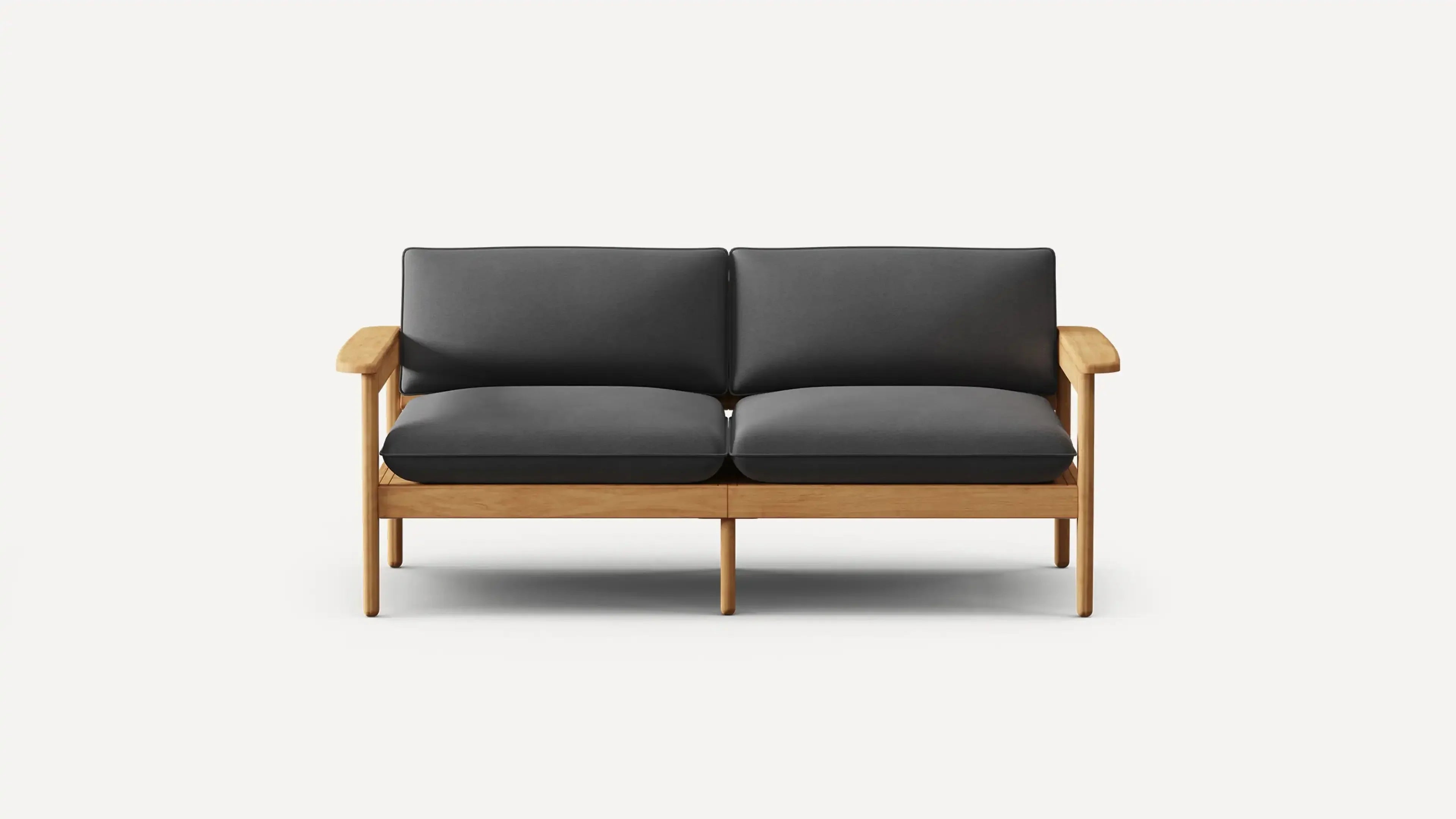 Two-seater sofa with dark gray cushions and a natural wooden frame, featuring simple, modern design and armrests.