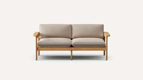 Two-seater sofa with light beige cushions and natural wood frame against a white background.