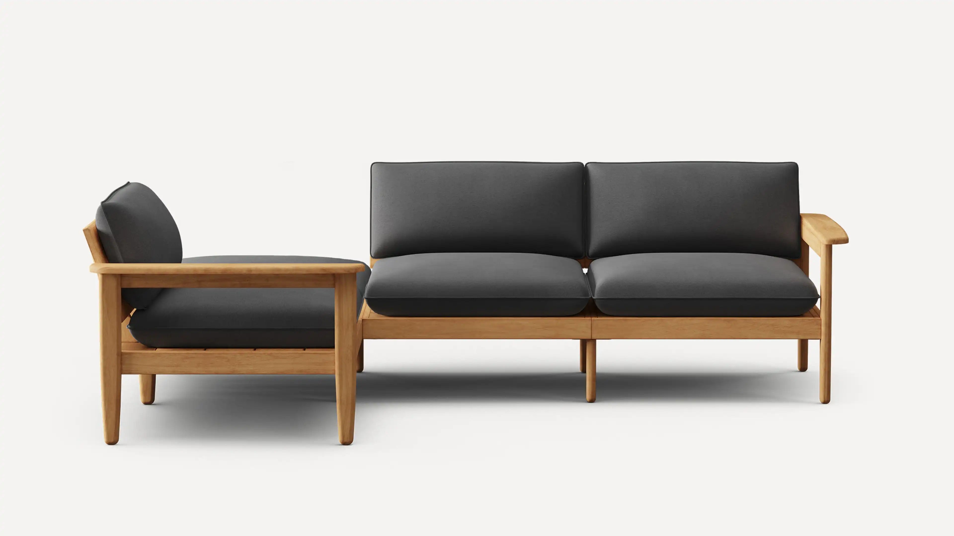 Modern wooden-frame sofa with dark gray cushions, featuring a minimalist design and clean lines.