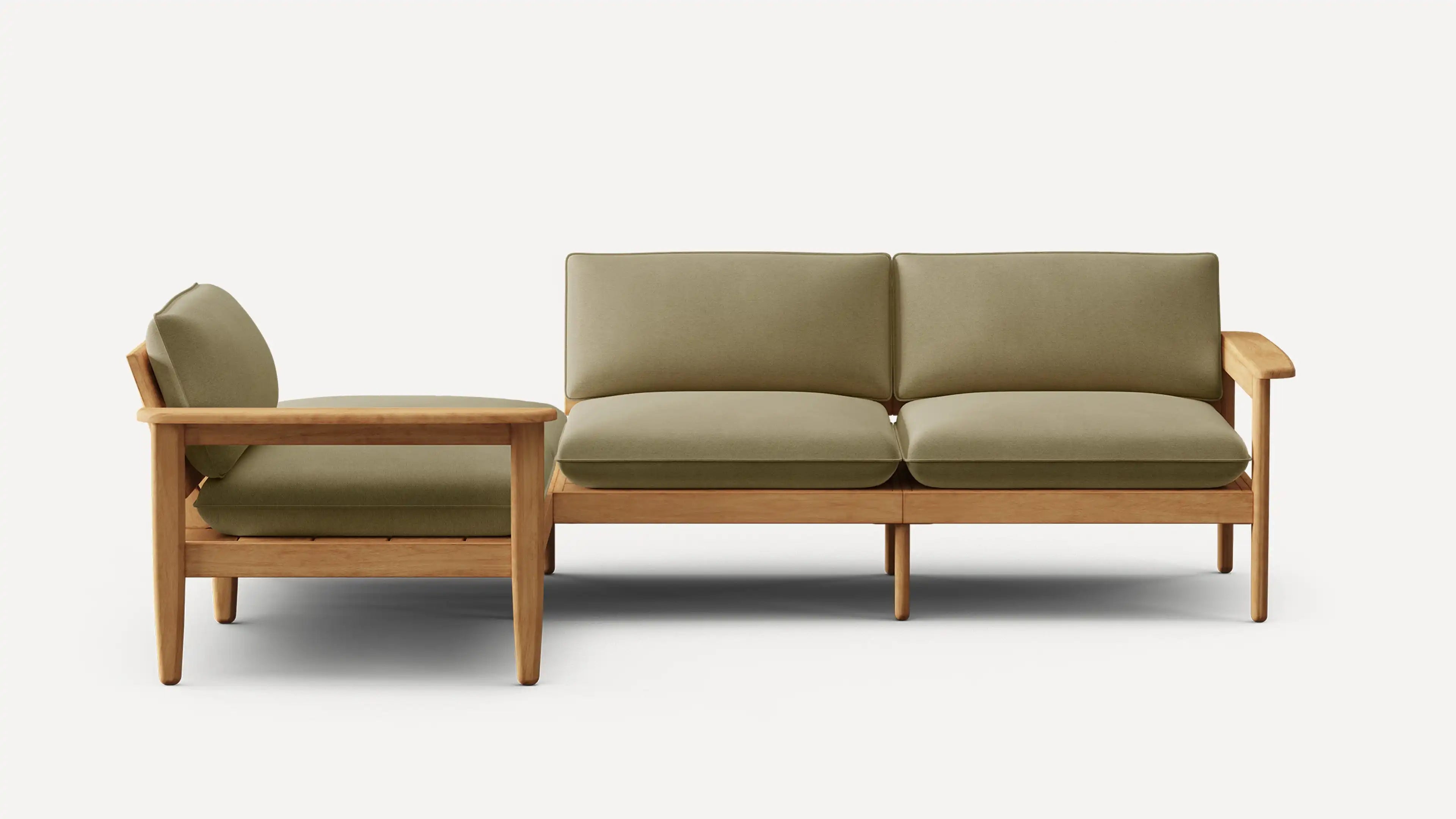 Modern sectional sofa with light wood frame and olive-green cushions, featuring a right-angled design and clean lines.