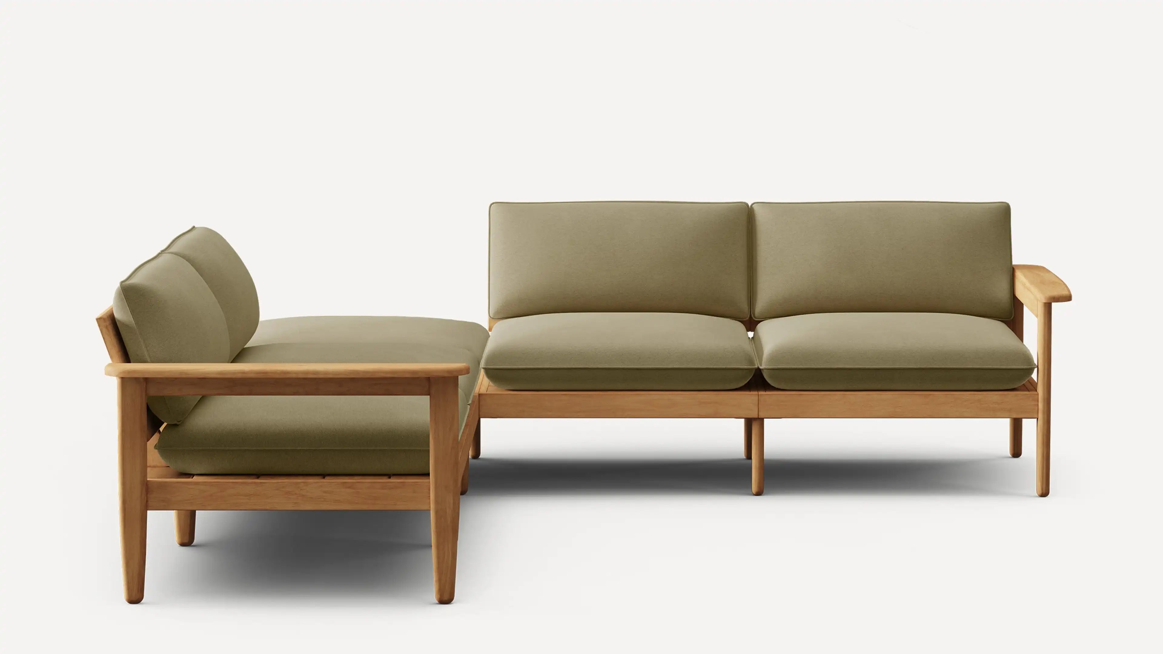 L-shaped sectional sofa with olive green cushions and a light wooden frame, featuring armrests on both ends.