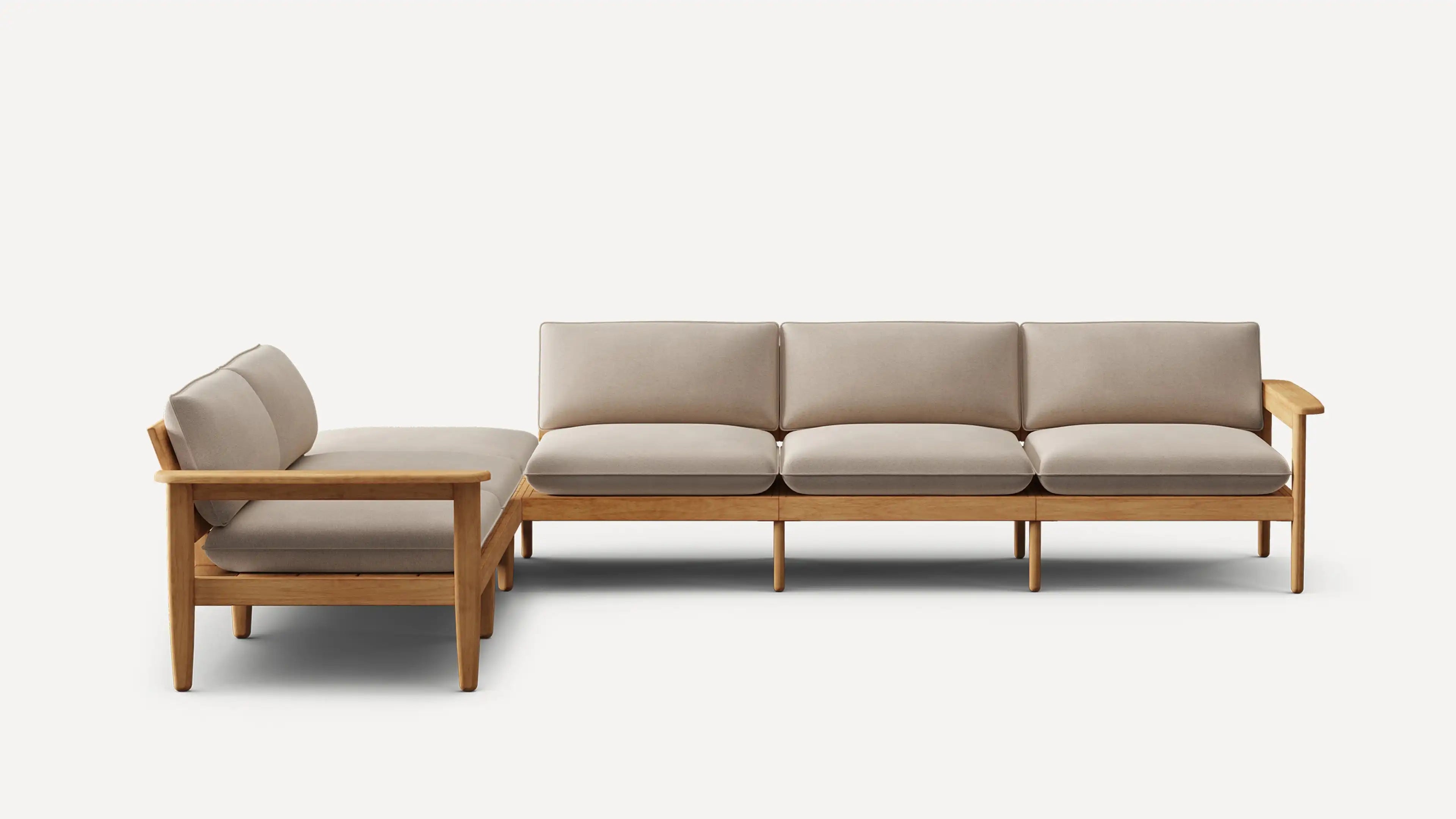 Modern L-shaped sectional sofa with beige cushions and light wooden frame, designed for indoor living spaces.