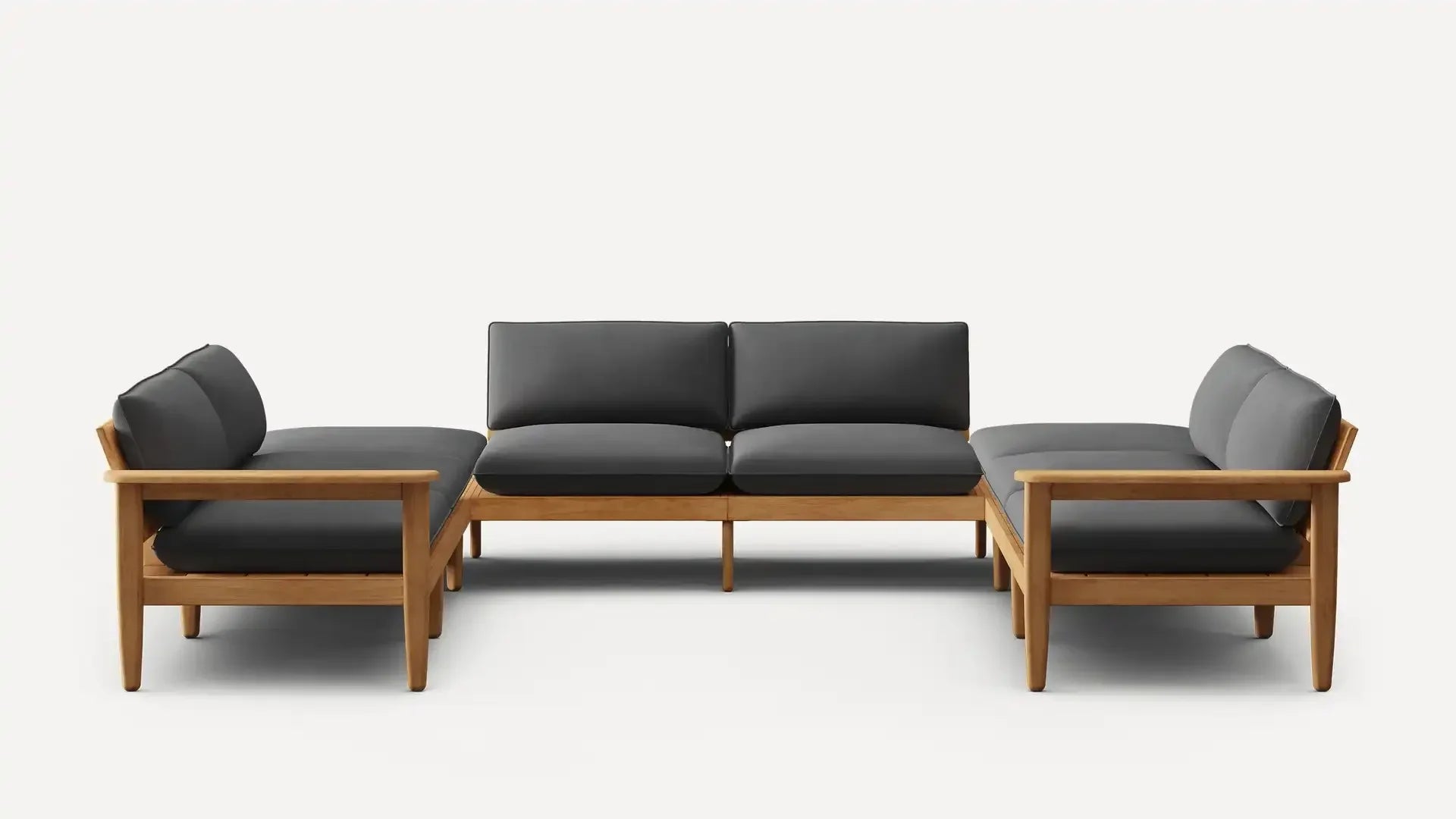 Modern L-shaped sectional sofa with smooth dark gray cushions and a natural wood frame, offering spacious seating.