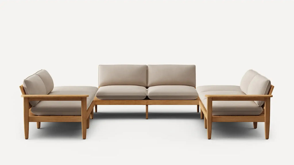 Modern L-shaped sectional sofa with beige cushions and wooden frame, featuring clean lines and minimalistic design.