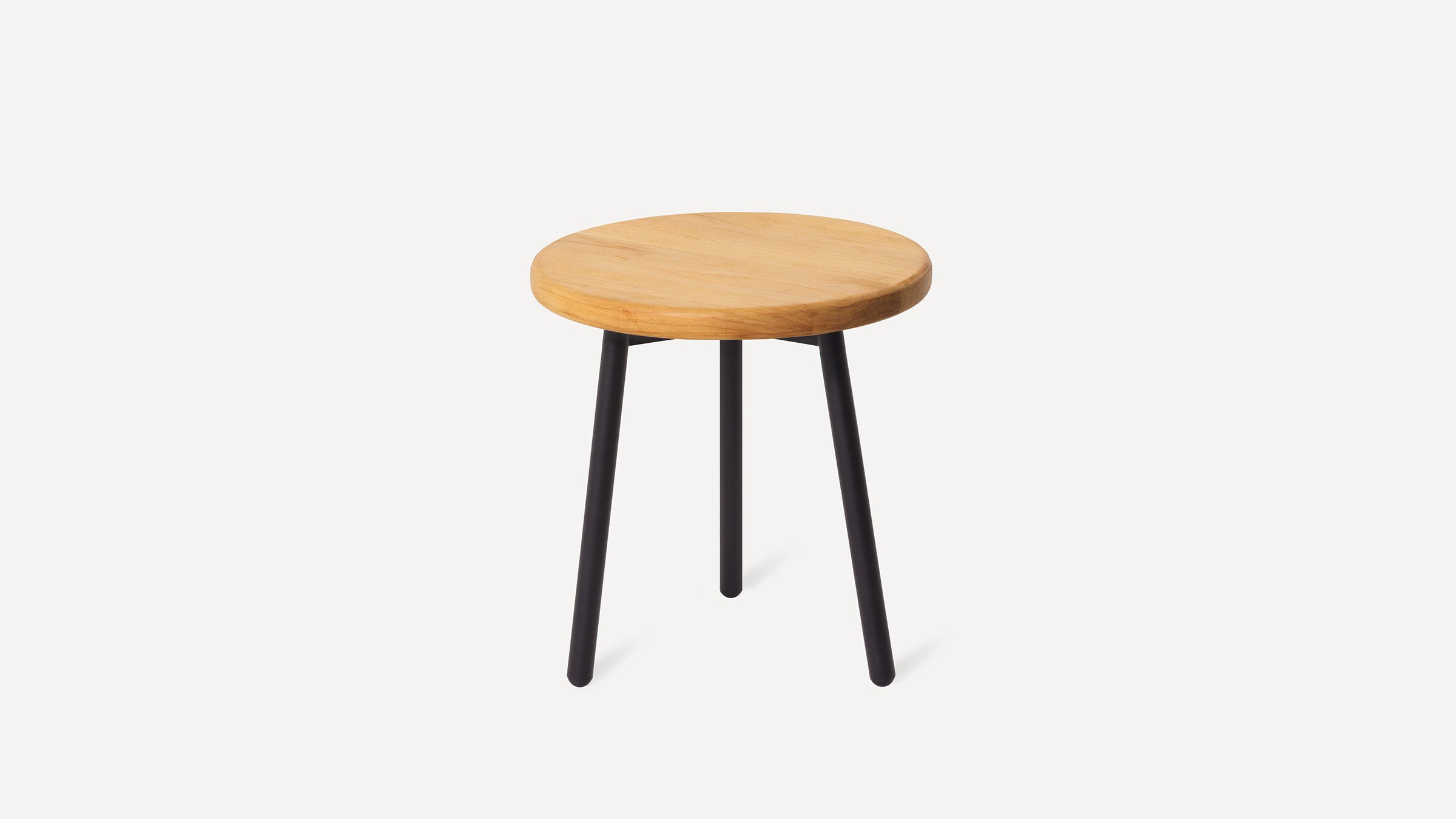 round wooden stool with black legs and a wooden seat