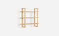 Wall-mounted wooden shelf unit with three horizontal shelves and open rectangular side frames in a natural light oak finish.