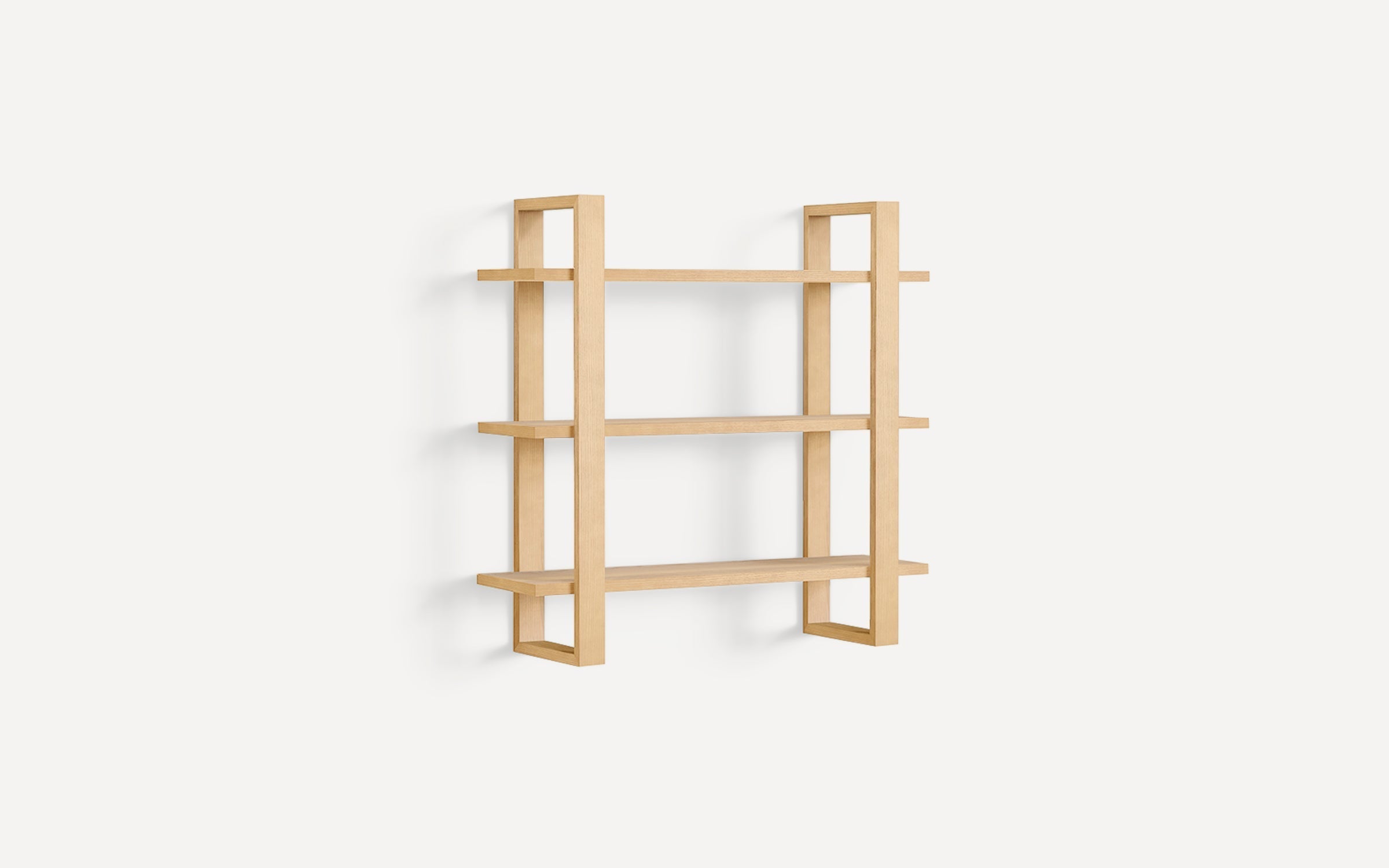 Wall-mounted wooden shelf unit with three horizontal shelves and open rectangular side frames in a natural light oak finish.