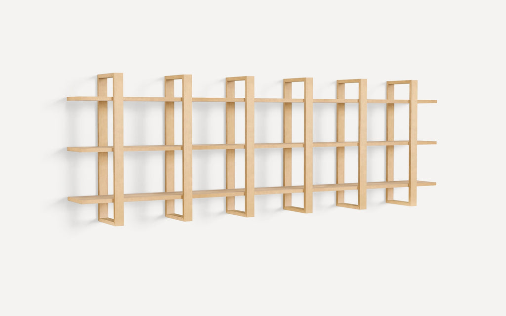 Modern light wood wall-mounted shelving unit with three horizontal shelves supported by six vertical rectangular frames.