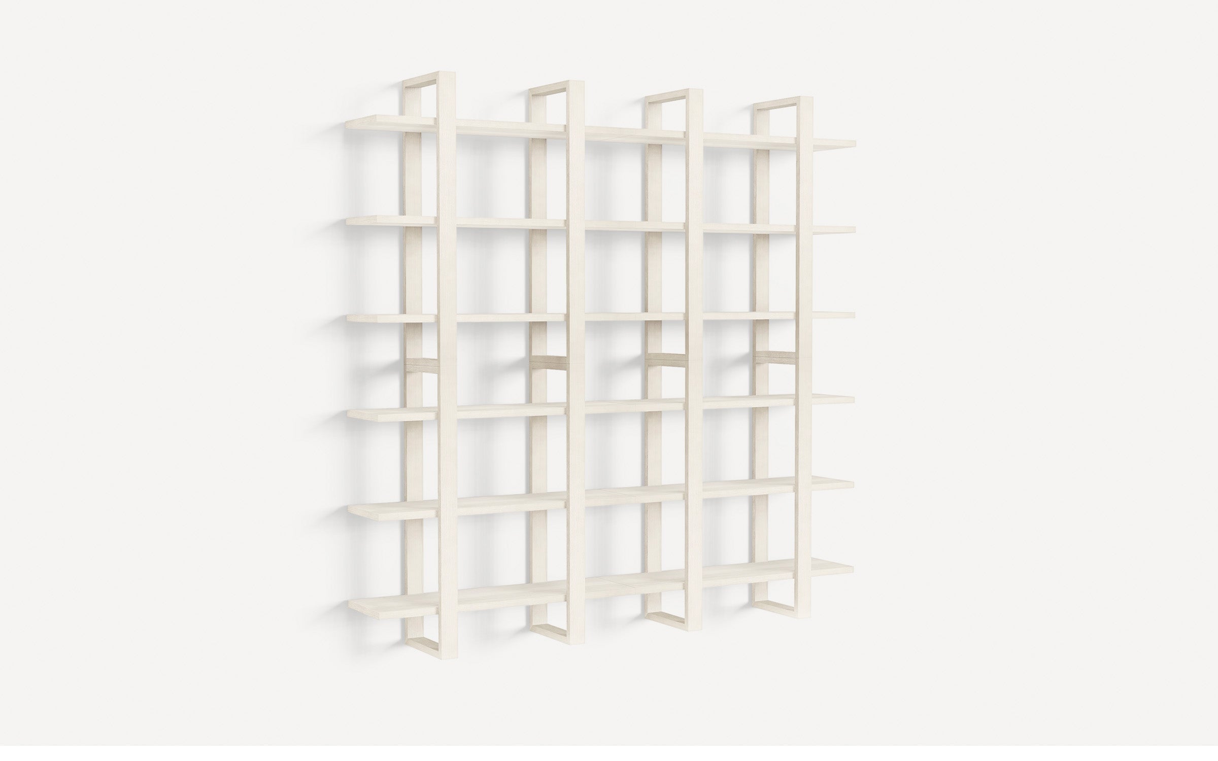 Light wood modern wall-mounted shelving unit with multiple horizontal and vertical open shelves.