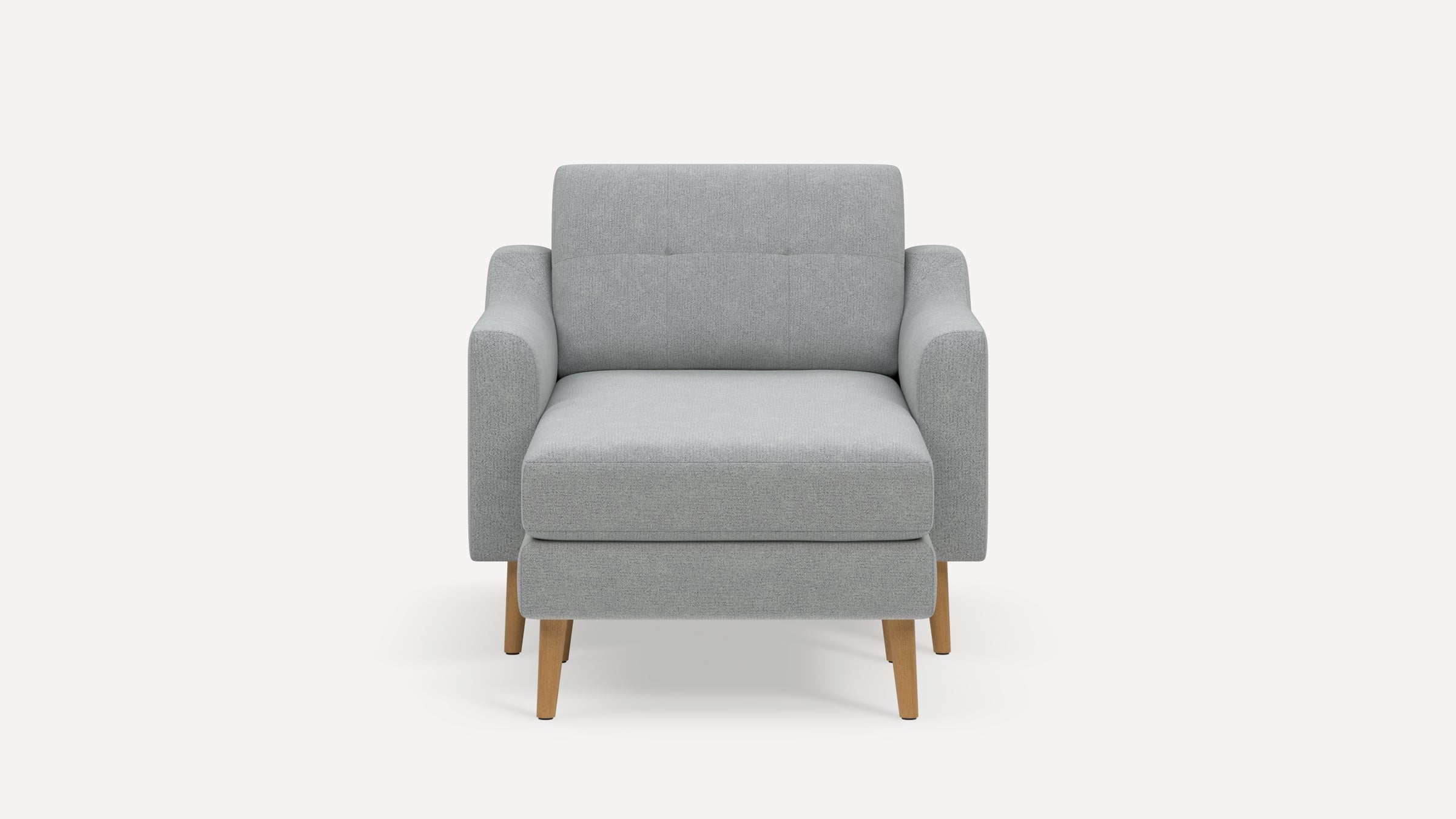 Front view of a modern light gray upholstered armchair with wooden legs and a cushioned seat and backrest.