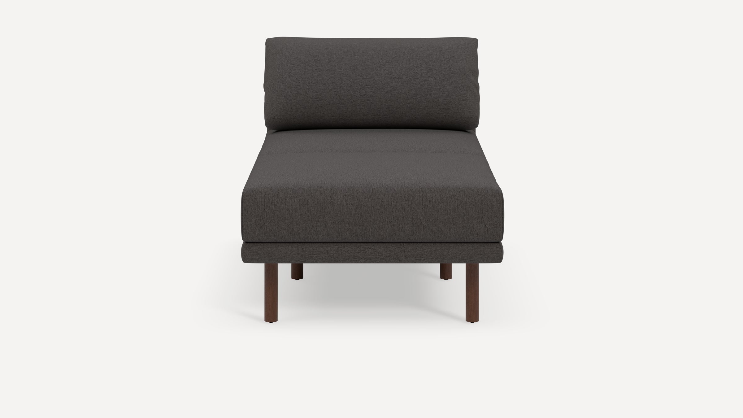 Modern dark gray armless lounge chair with cushioned seat and backrest, supported by four wooden legs.
