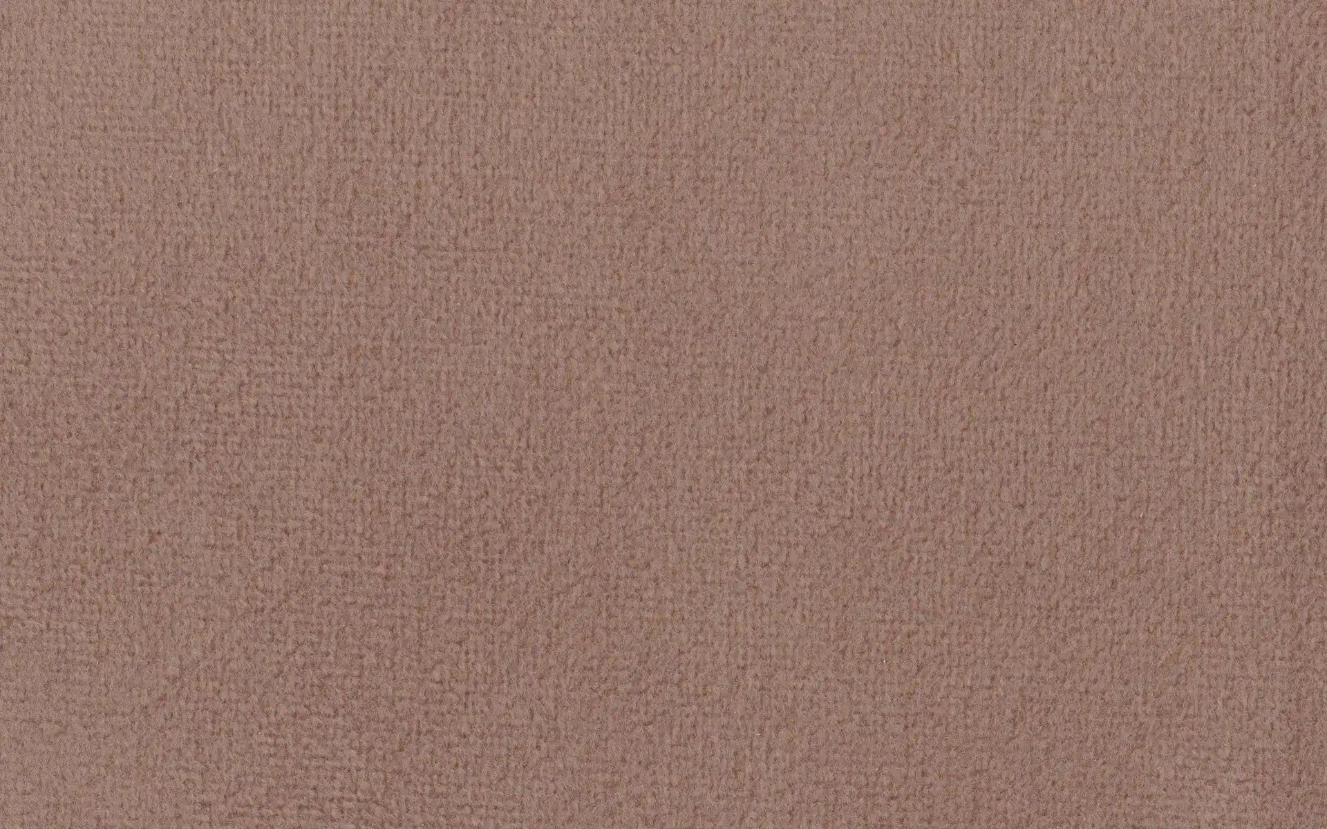 Close-up of soft, plush fabric in a muted, warm taupe color with a slightly textured surface.