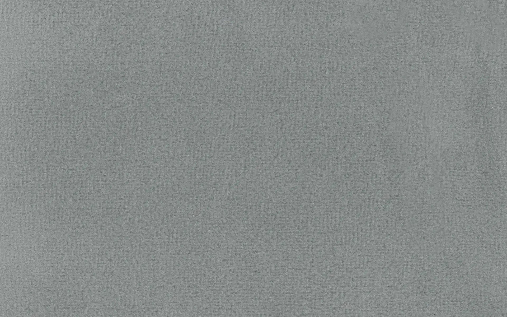 Close-up of smooth, gray fabric texture with a subtle woven pattern, suitable for upholstery or clothing.