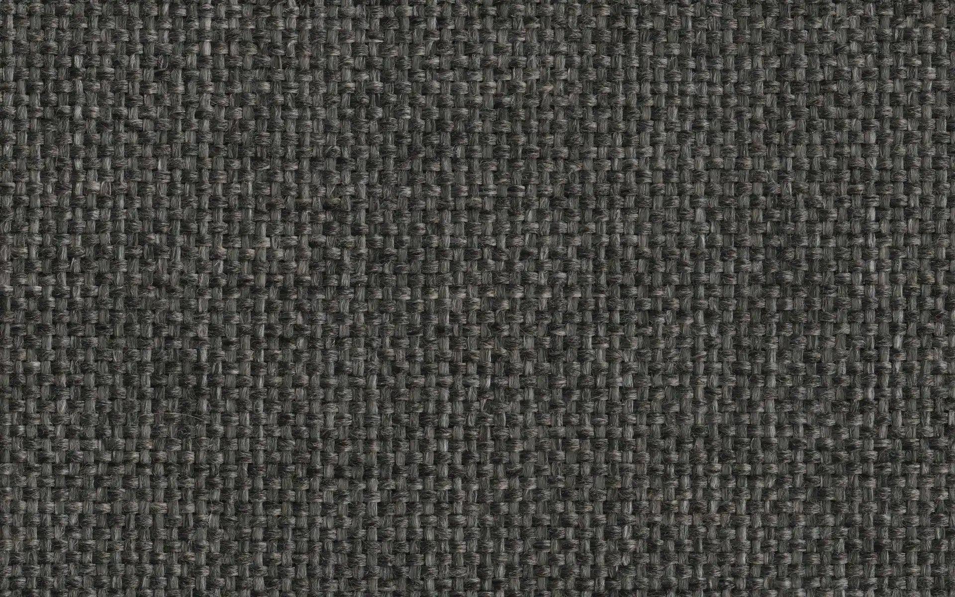 Close-up of dark gray woven fabric texture with a grid-like pattern of interlaced fibers.