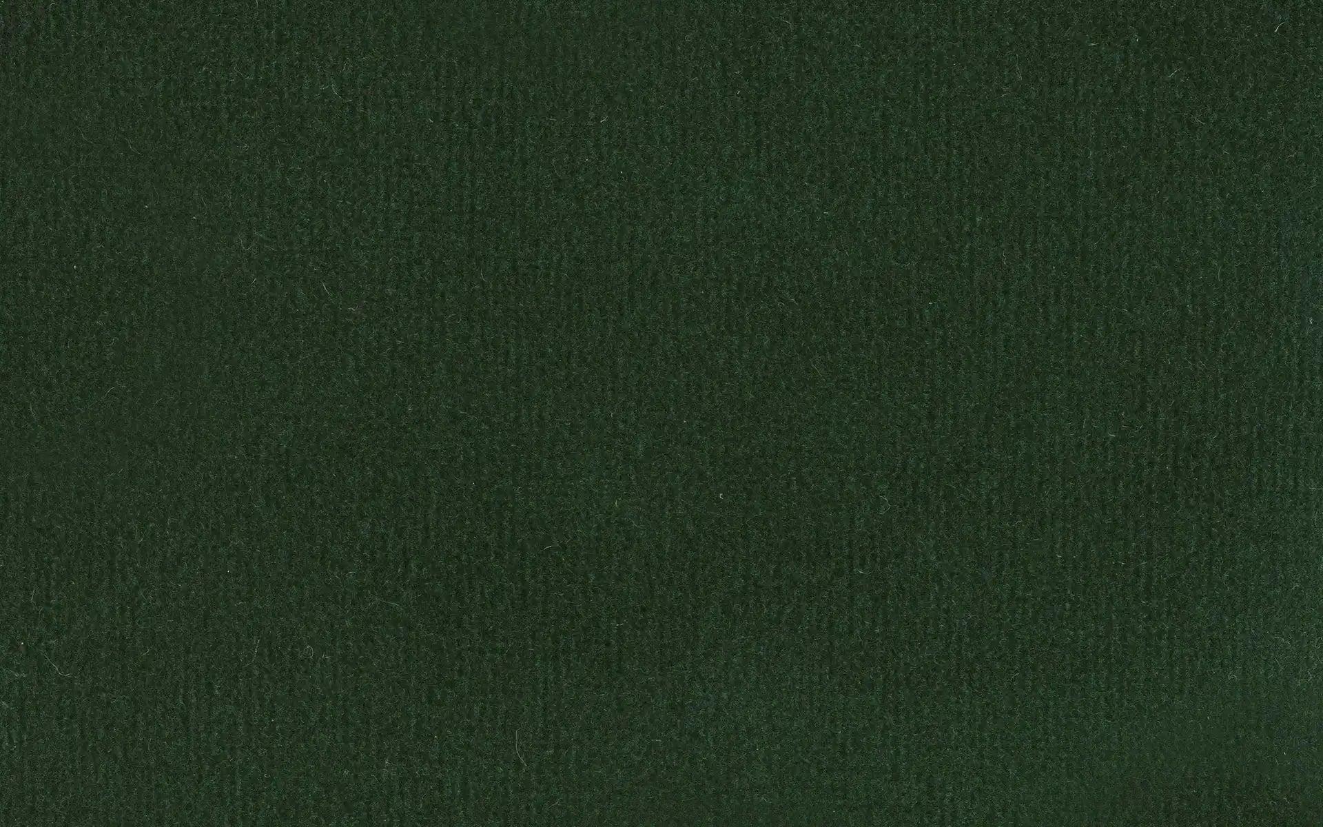 Dark forest green textured fabric swatch with subtle ribbed pattern, suitable for upholstery or apparel.