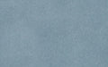 Close-up of a soft fabric swatch in muted blue-gray with a smooth, slightly fuzzy texture.