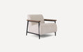 Modern armchair with plush, textured off-white upholstery, black metal frame, and wooden armrests on a clean white background.