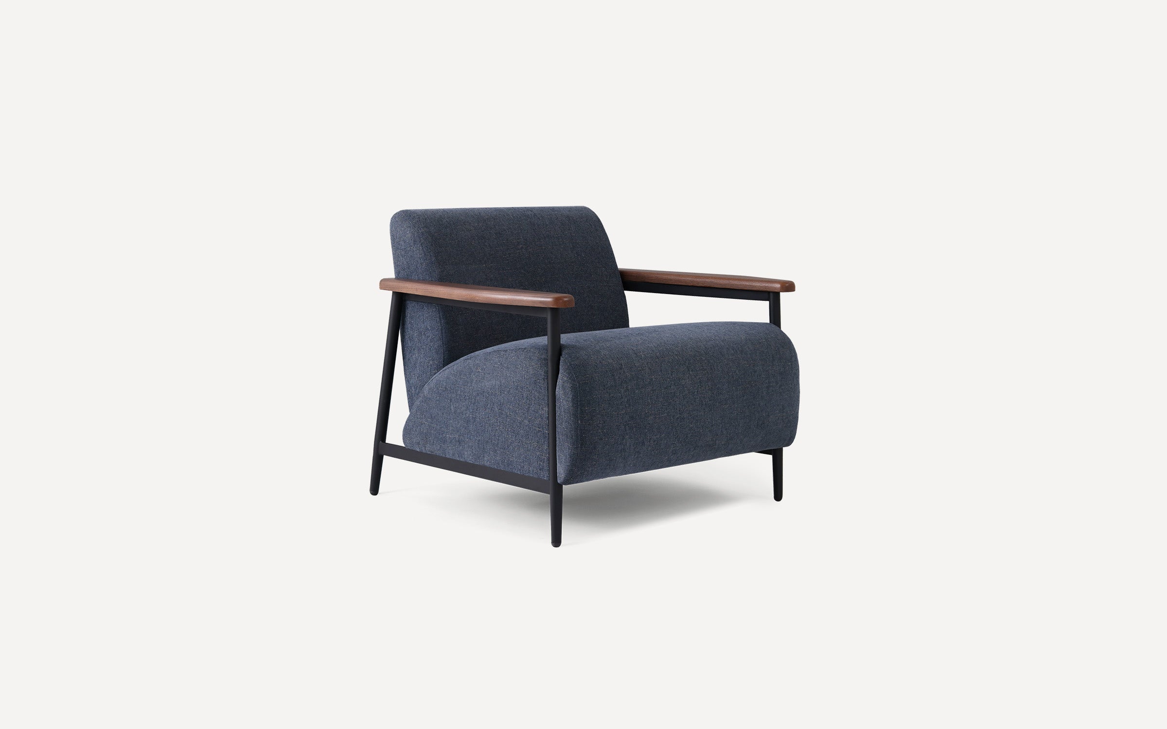 Modern armchair with dark blue fabric upholstery, wooden armrests, and black metal frame on white background.