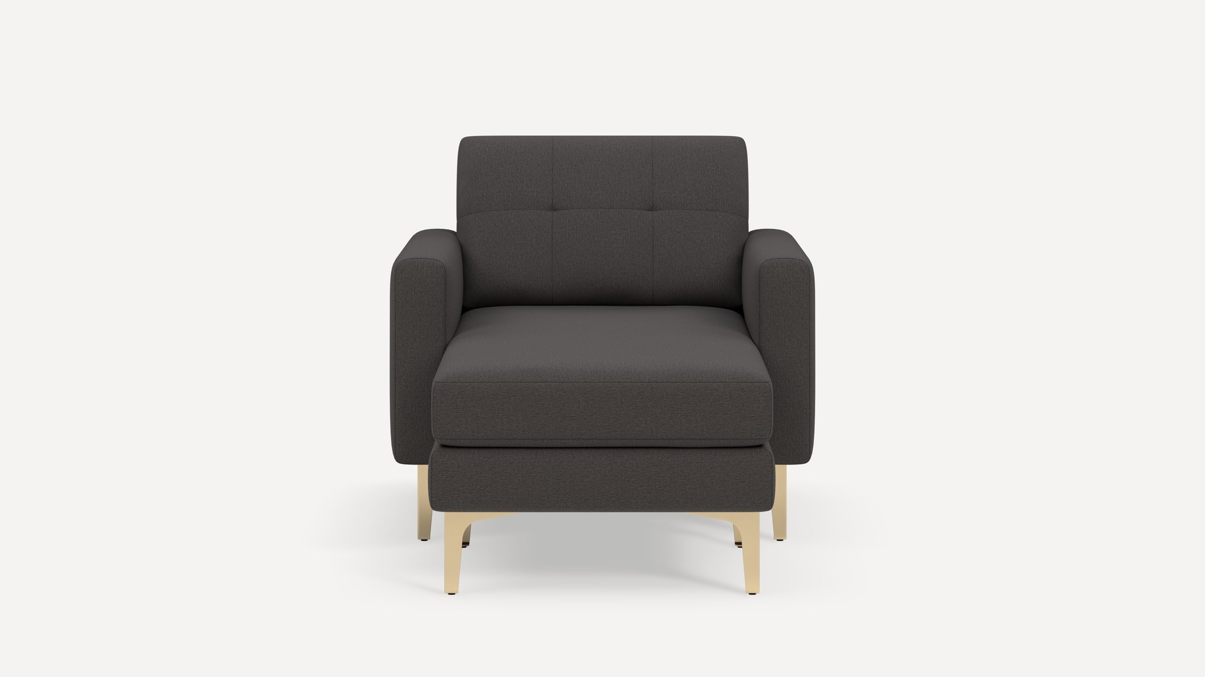 Front view of a modern dark gray armchair with cushioned seat, tufted backrest, armrests, and light wooden legs against a white background.
