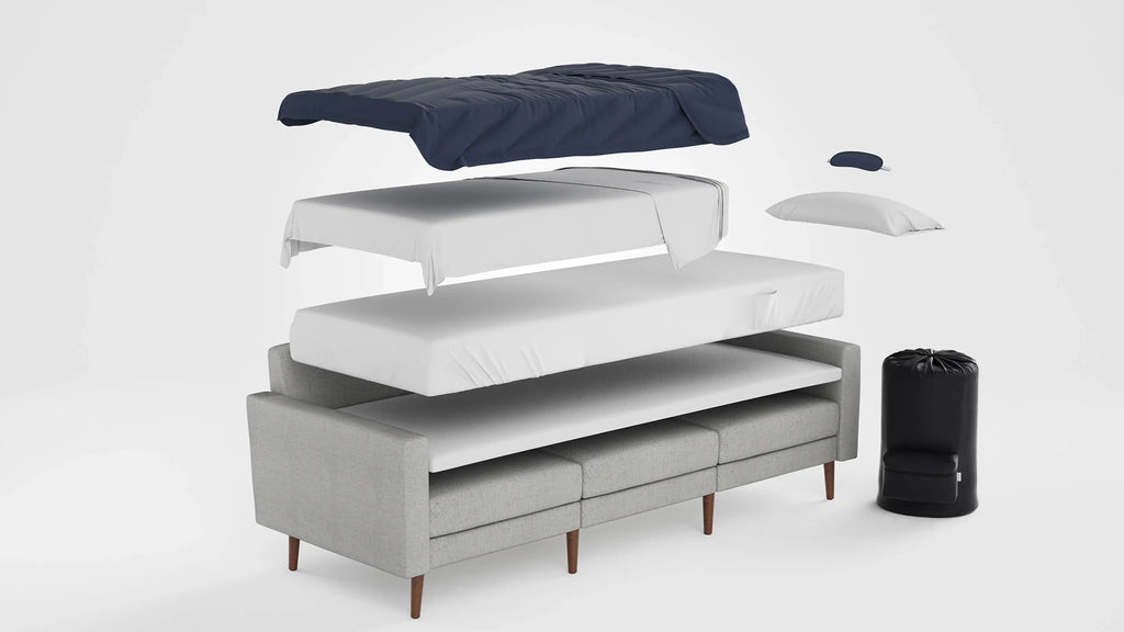 modern sofa with mattress and pillows on white background