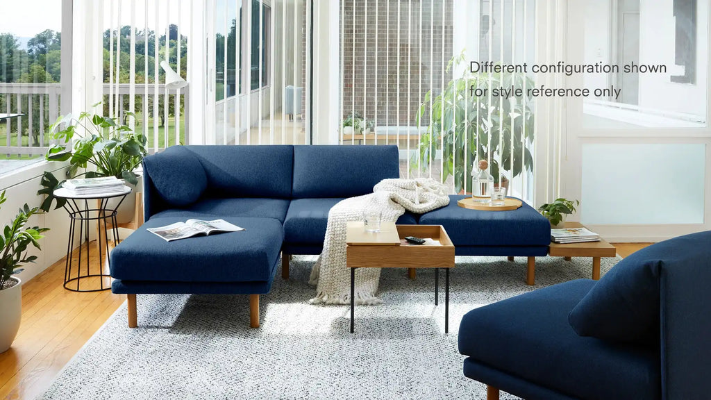 modern living room with blue sofa and wooden coffee table