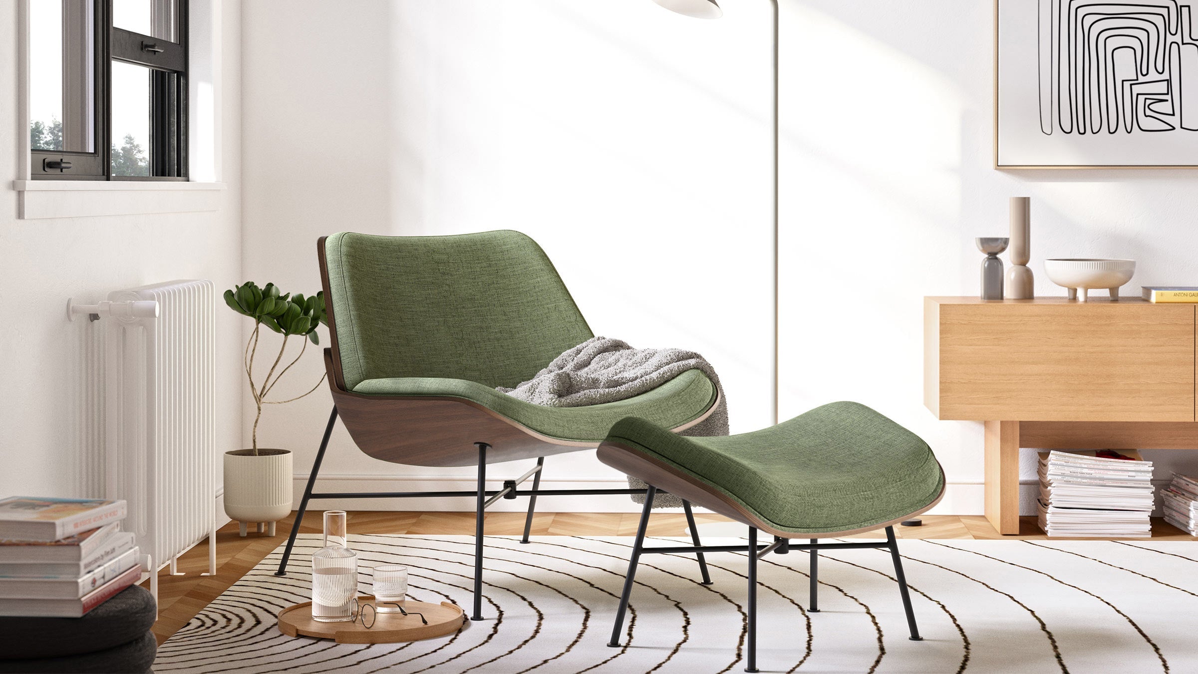 a green chair with a blanket on it in a modern living room
