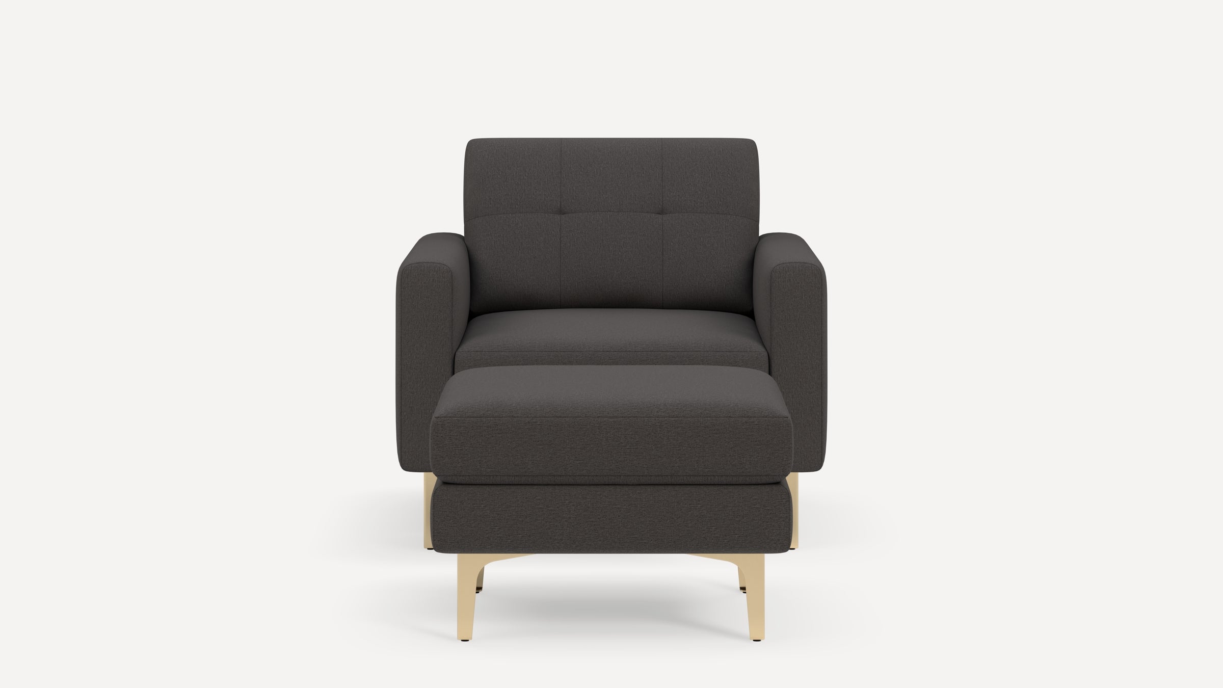 Front view of a modern dark gray armchair with matching ottoman and light wood legs, against a plain white background.