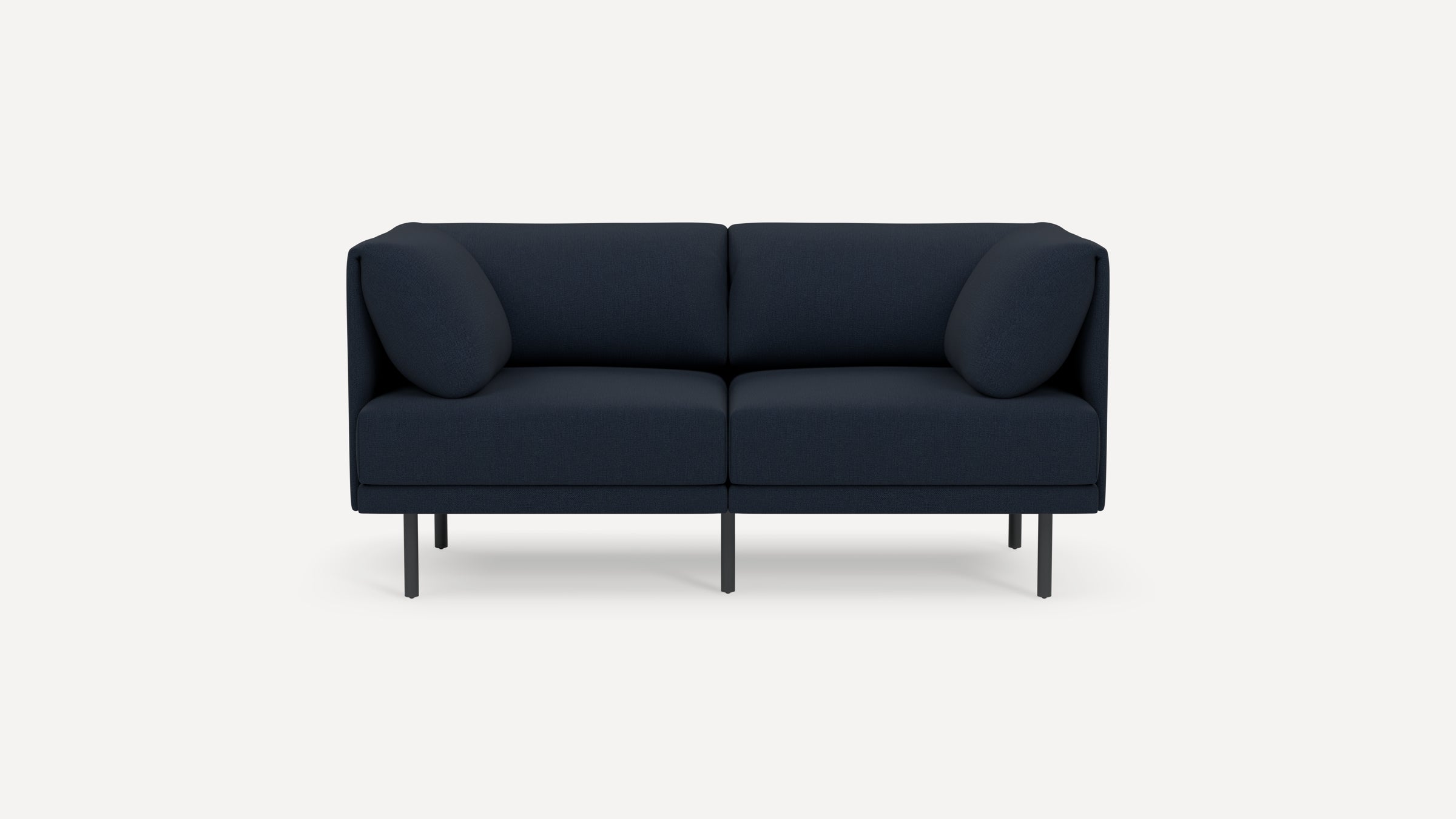 Modern navy blue two-seater sofa with rounded cushions and slim black metal legs, set against a plain white background.